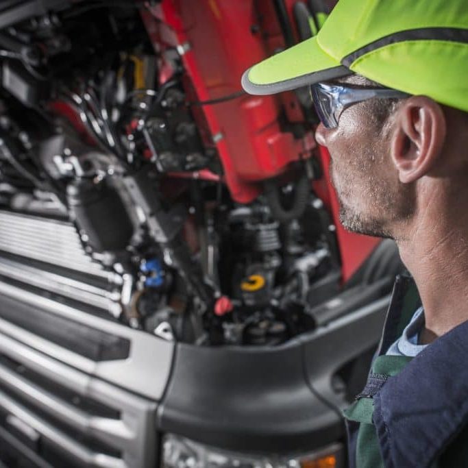 semi-trucks-caucasian-mechanic-PG89WHW-1024x683